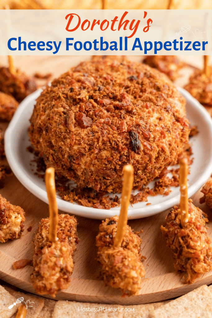 Top down photo of a round bacon covered cheeseball surrounded by football shaped mini cheeseballs