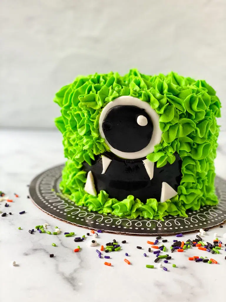 Fun 3 Eyed Green Monster Cake with Colourful Monster Friends | Susie's Cakes