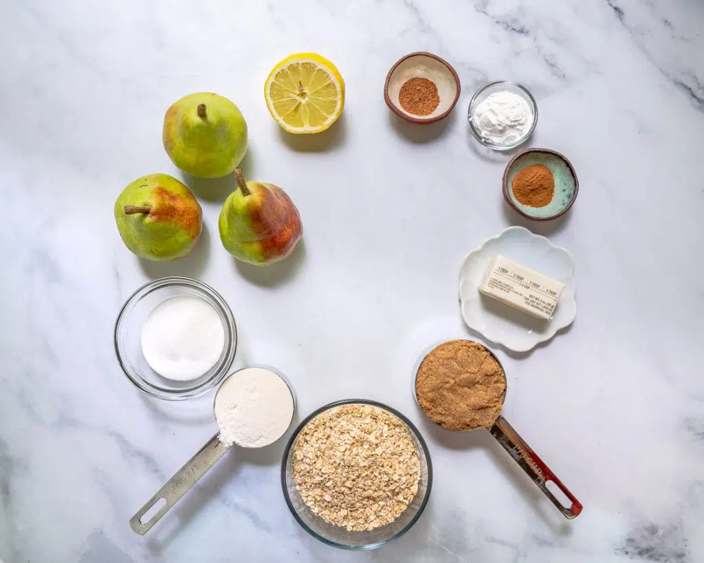 Ingredients used to make pear crisp topped with streusel with oats