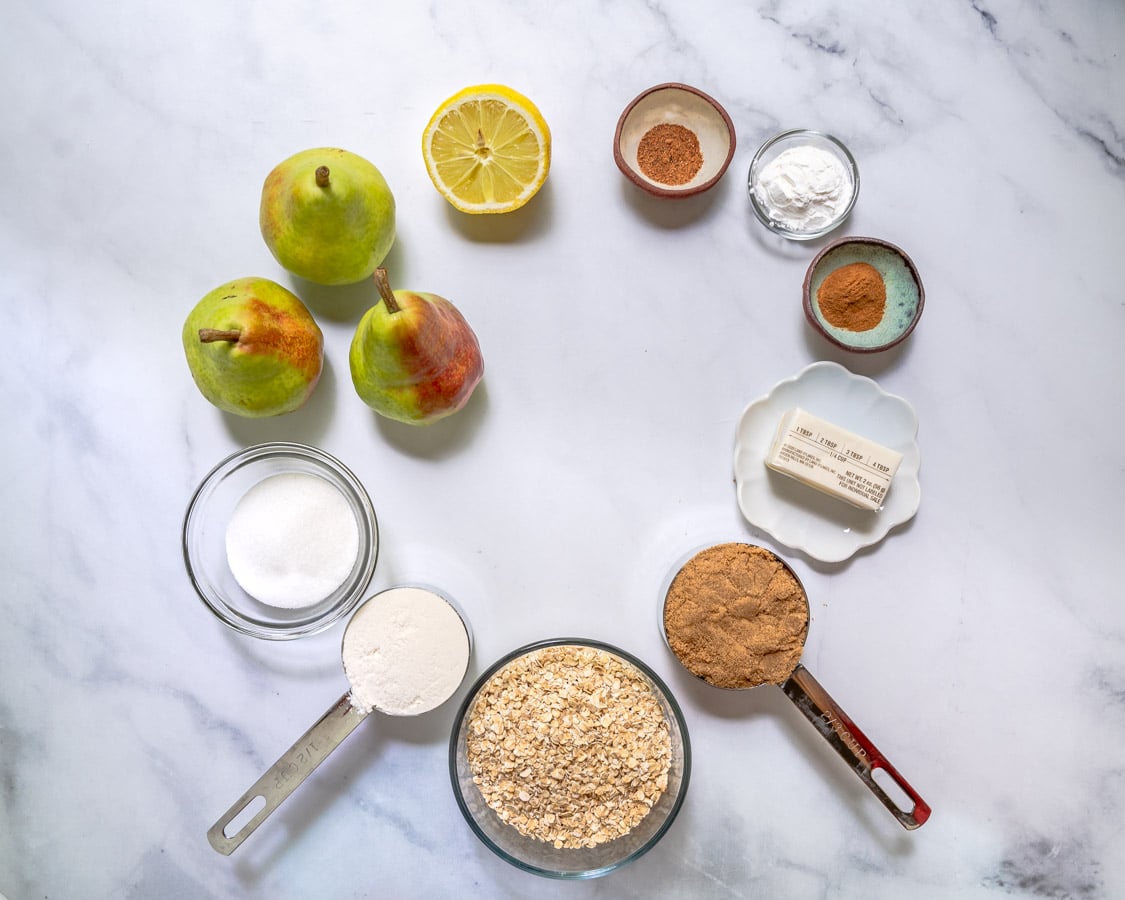 Ingredients used to make pear crisp topped with streusel with oats