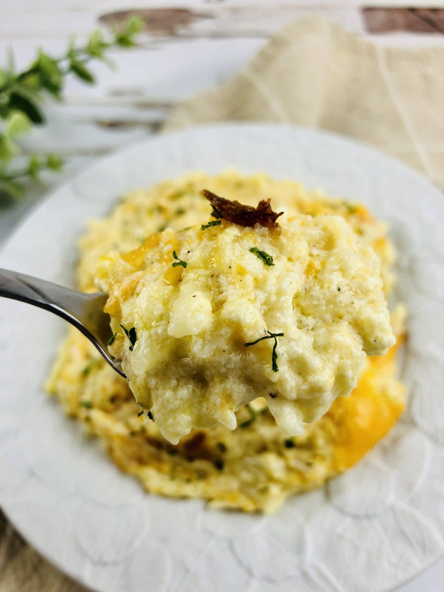 Cheesy Hashbrown Casserole Recipe on a plate.