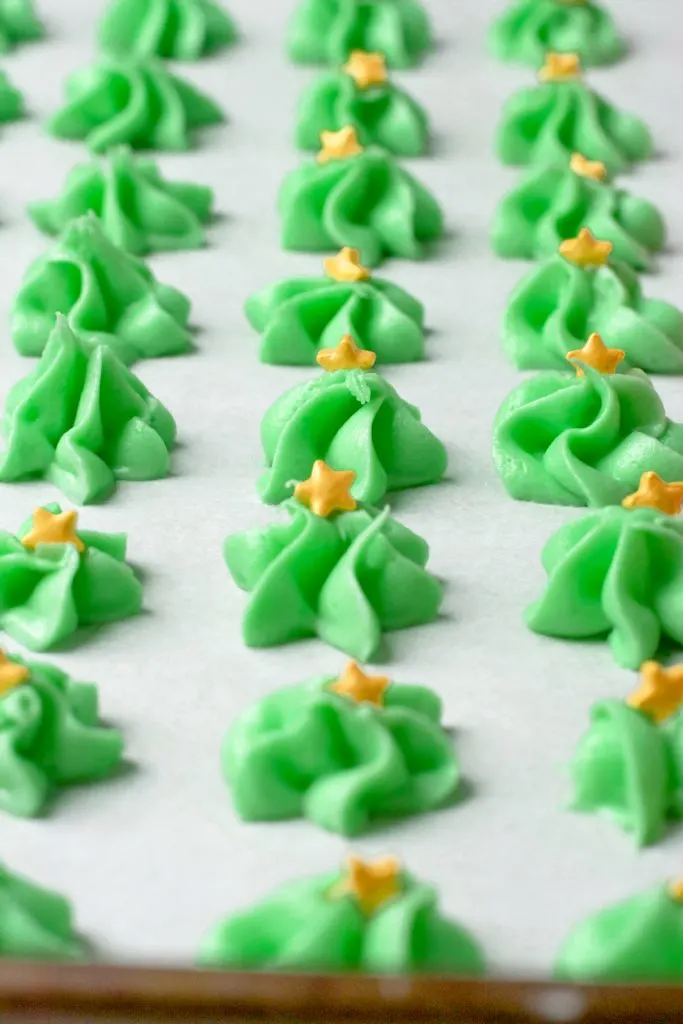 Cream cheese mints on parchment paper.