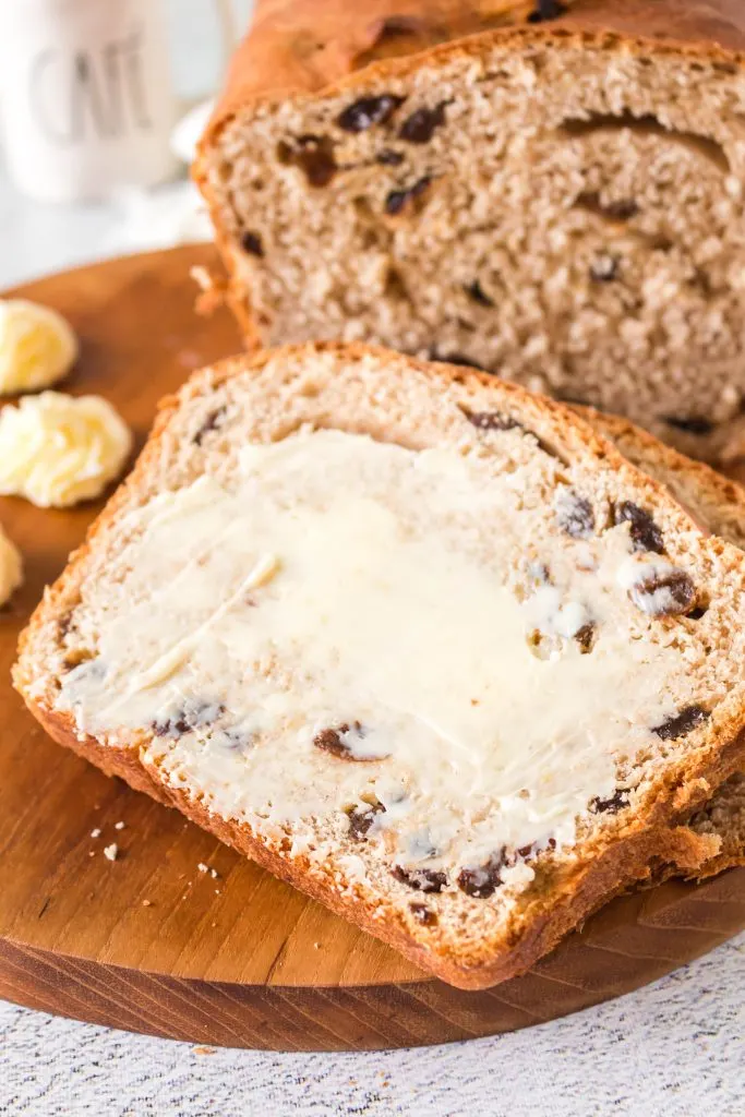 Single buttered slice of raisin bread.