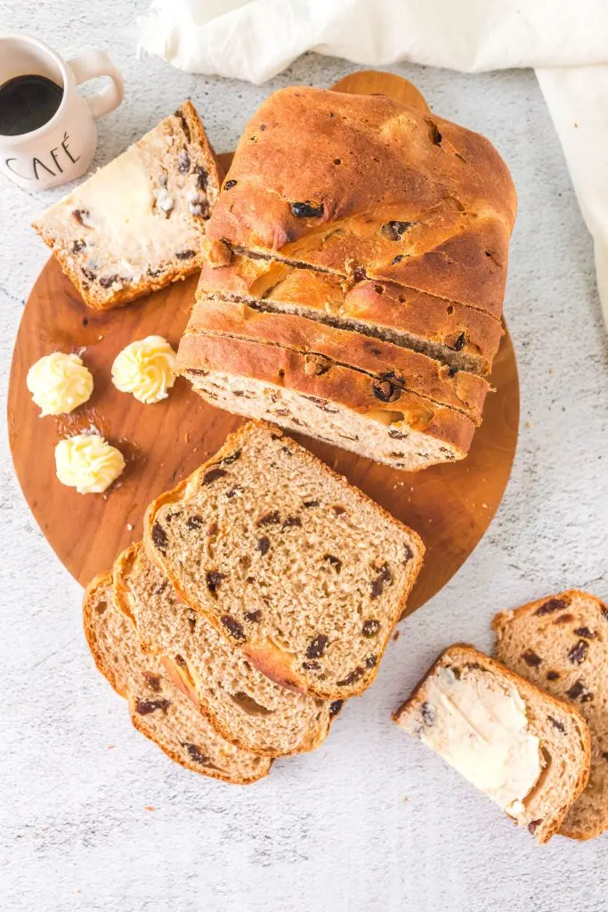 Sliced loaf of homemade cinnamon raisin bread.