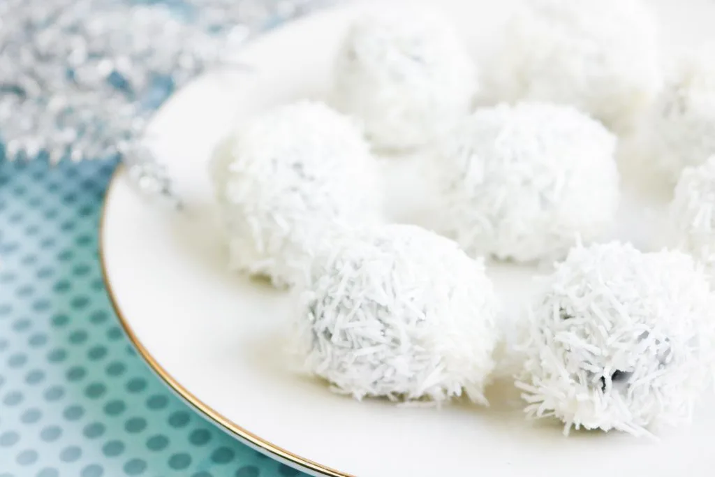 white chocolate Oreo truffles on a plate.