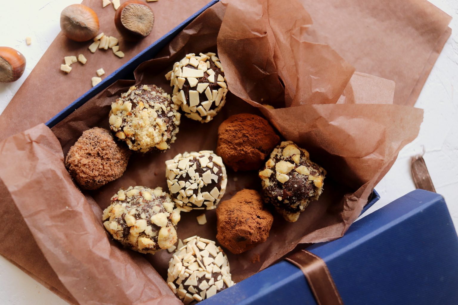 Finished homemade chocolate truffles in a box.