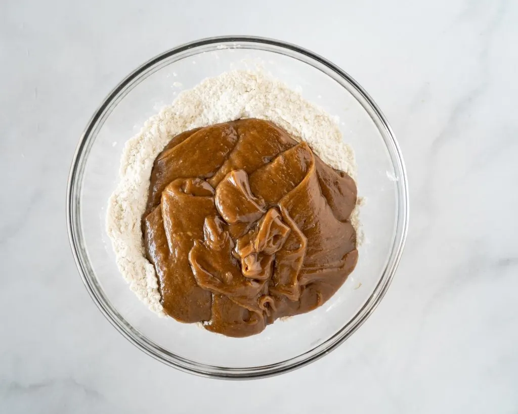 Peanut butter mixture added to dry ingredients.