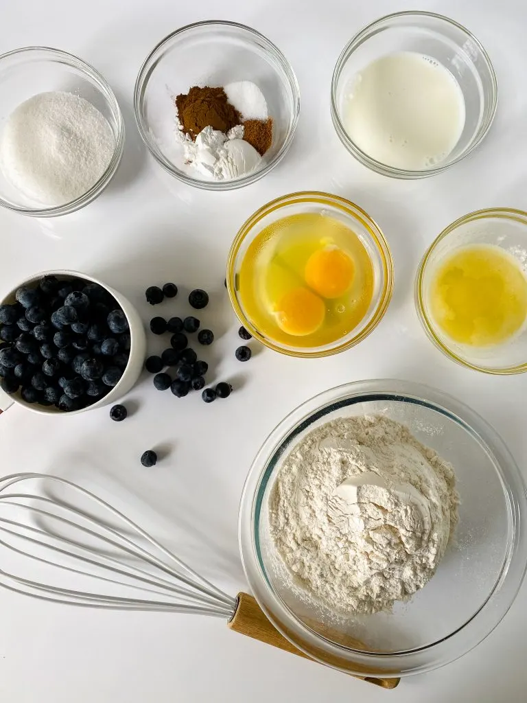 Ingredients. All-Purpose Flour.
White Granulated Sugar. 
Baking Powder.
Cinnamon.
Ground Nutmeg.
Salt.
Unsalted Butter.
Milk. 
Grade A Large Eggs. 
Vanilla Extract.
Blueberries.
Canola or Vegetable oil. C