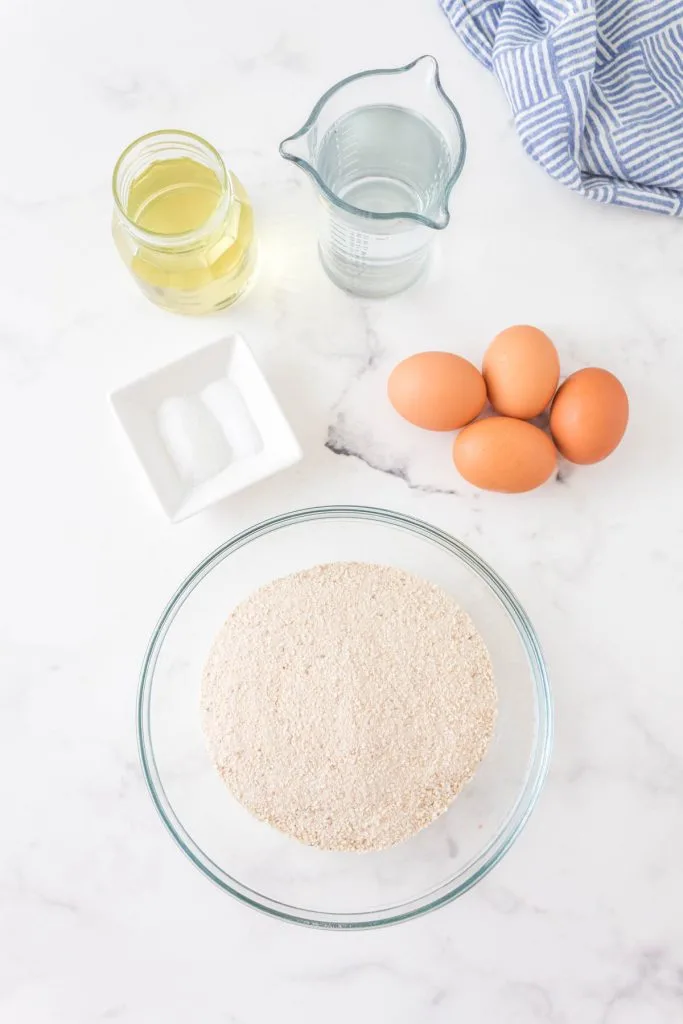 Ingredients used to bake passover rolls including Matzo, eggs, water, sugar and olive oil.