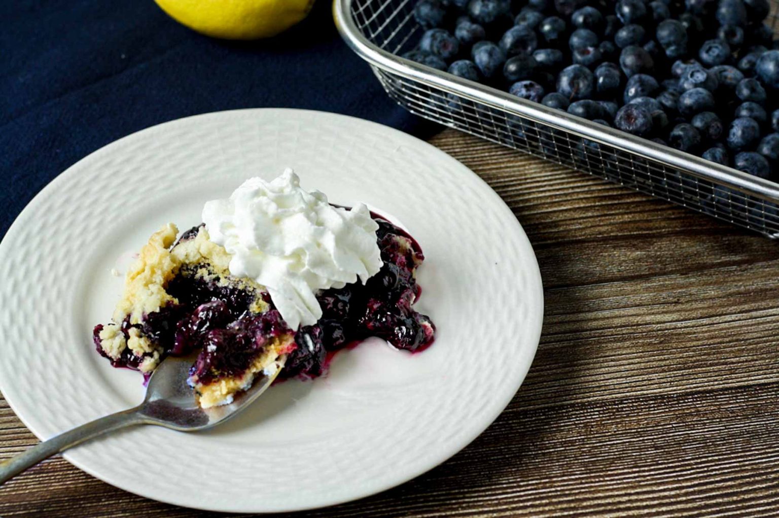 Slice of blueberry dump cake.