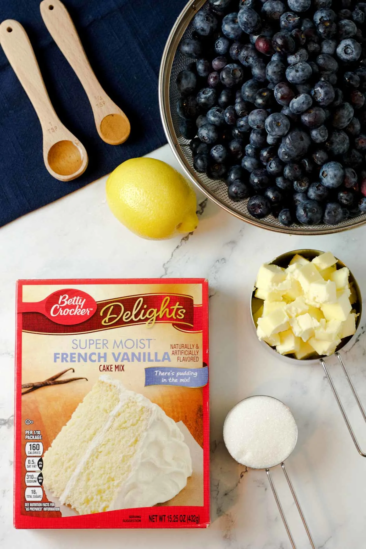 Ingredients: lemon, blueberries, butter, cake mix, sugar, vanilla, cinnamon.