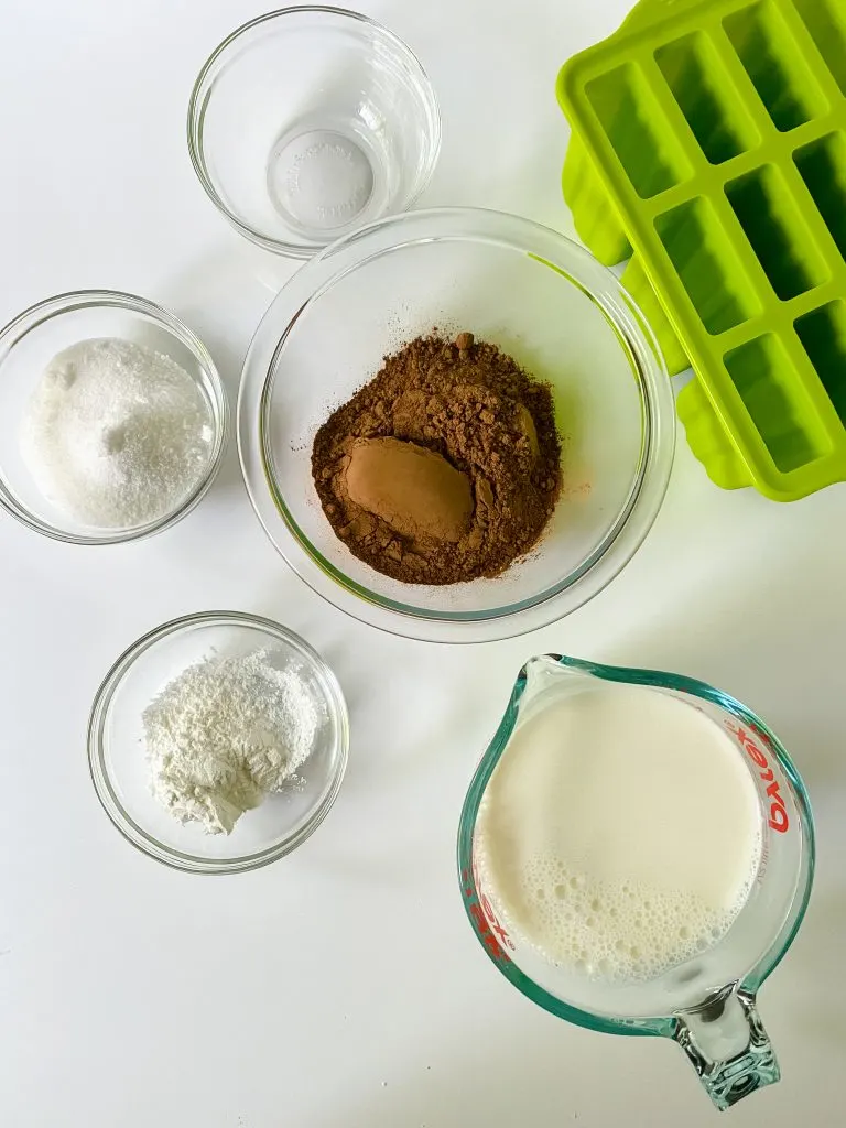 ingredients: cornstarch, sugar, milk, cocoa powder, salt.and vanilla. Shown with popsicle mold.