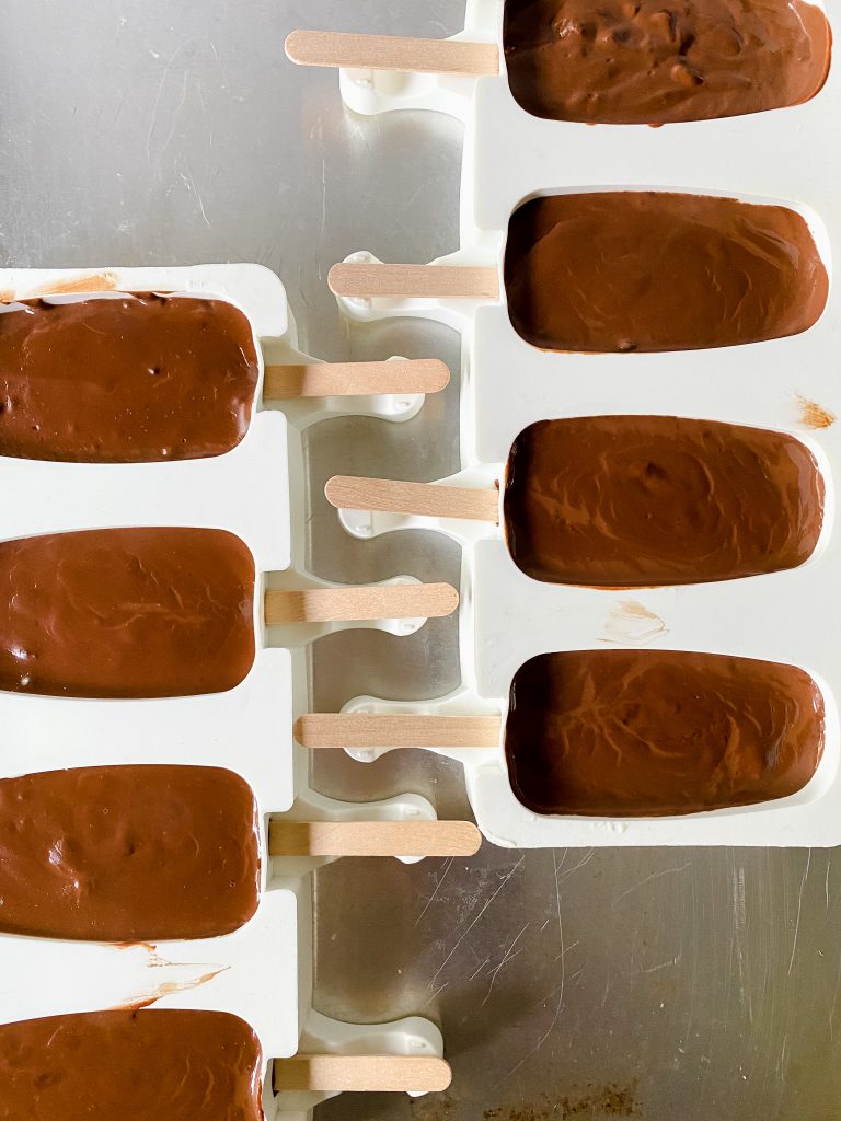 Chocolate fudge pop recipe in a popsicle mold. 
