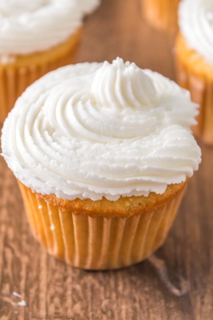 side view of frosted cupcake.