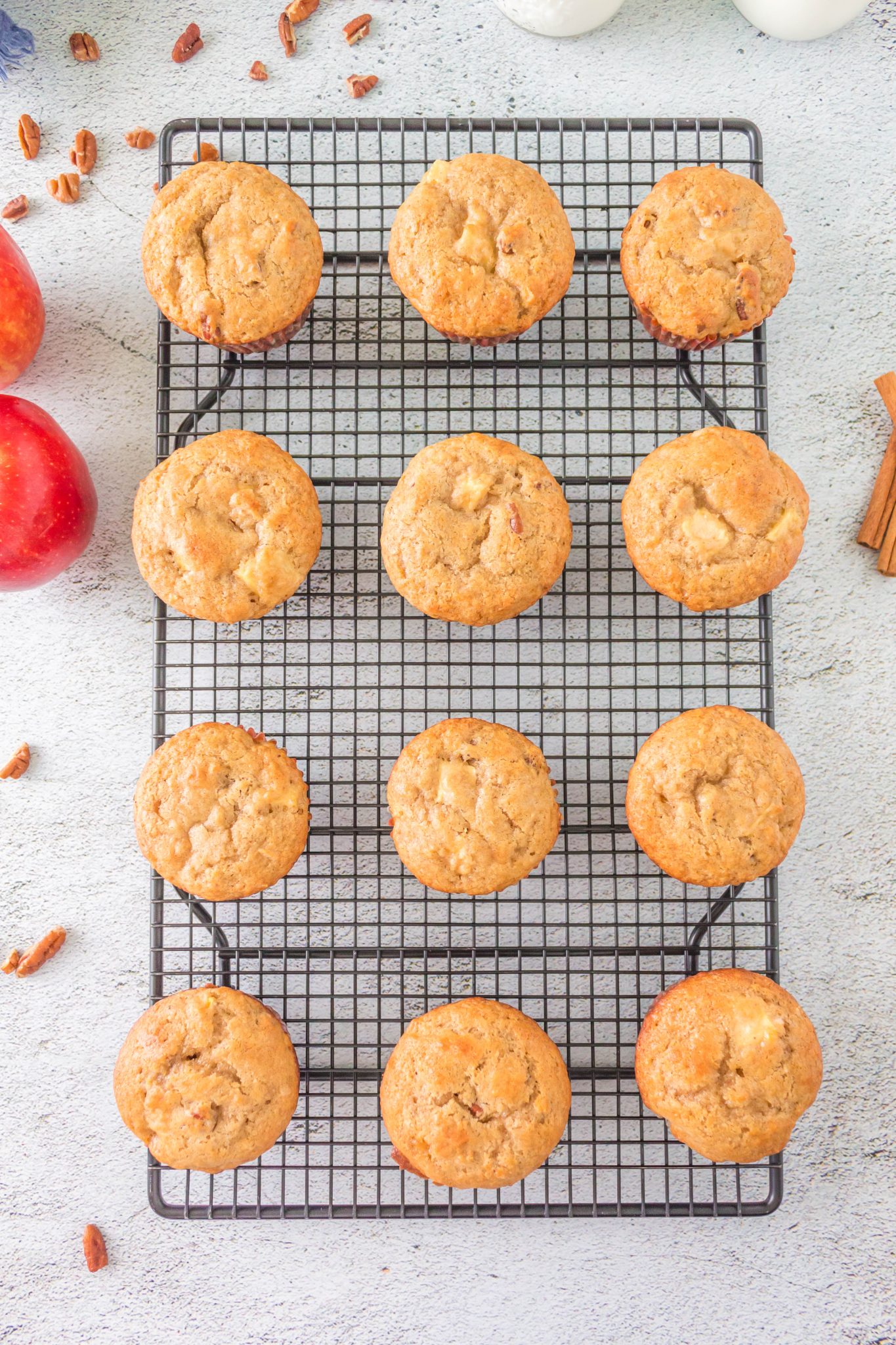 Cooling rack, with 12 muffins, top-down view.