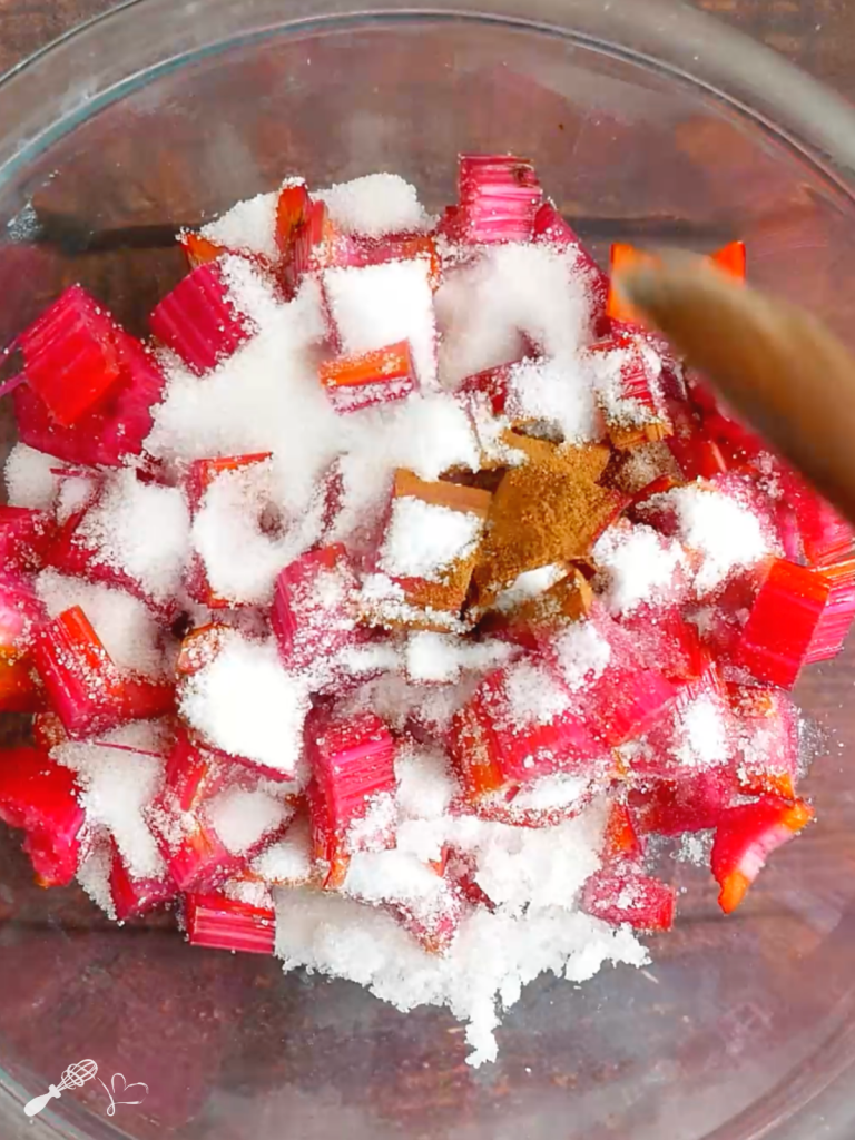 Strawberry rhubarb filling ingredients in a bowl.