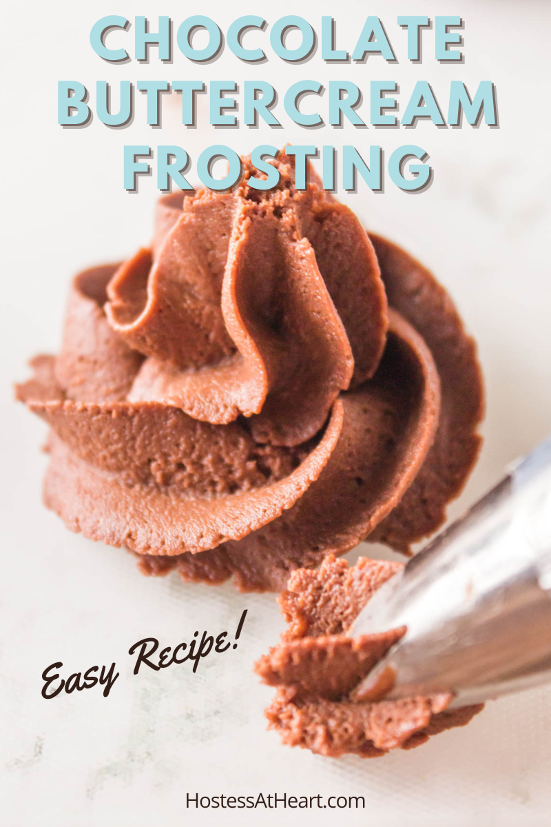 A swirl of chocolate buttercream frosting next to a piping tip.