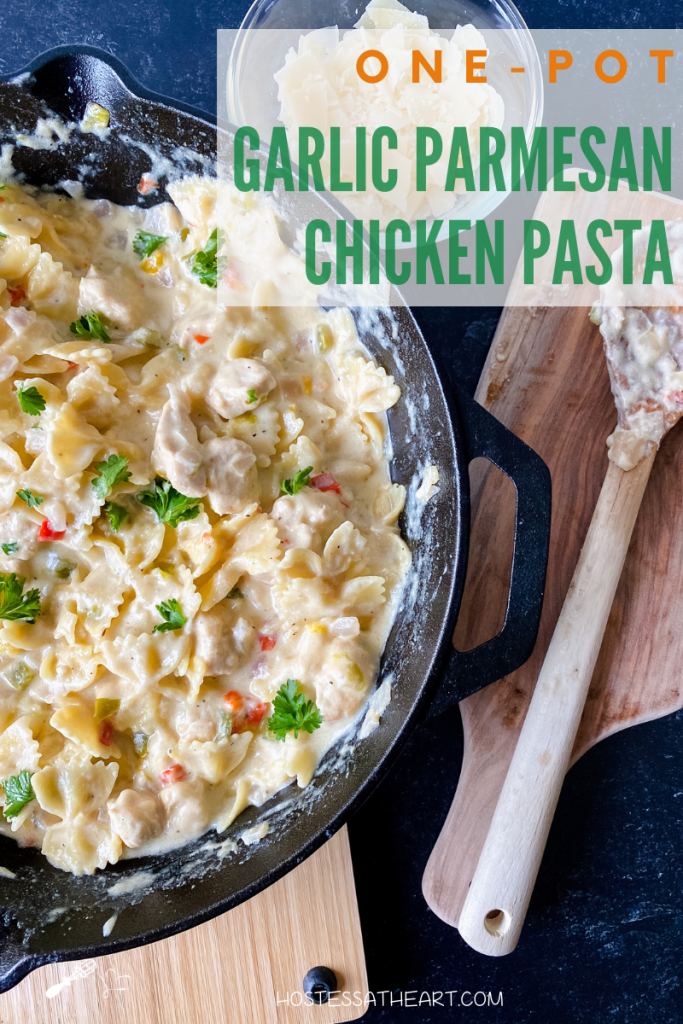 Top-down view of a skillet filled with parmesan chicken pasta.