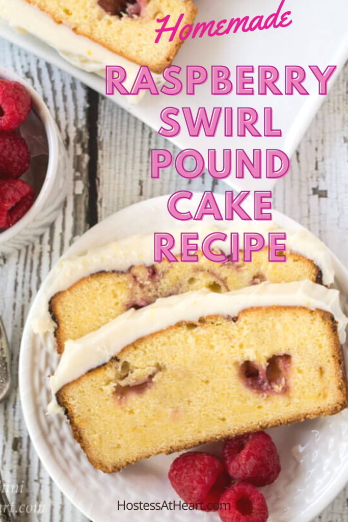 Slices of Raspberry Swirl Pound Cake sitting on a plate next to fresh raspberrie.