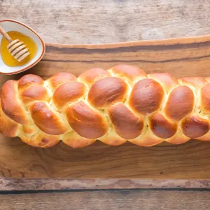 A loaf of braided challah bread