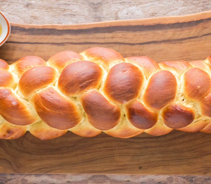 Top down view of a baked braid of Challah bread.