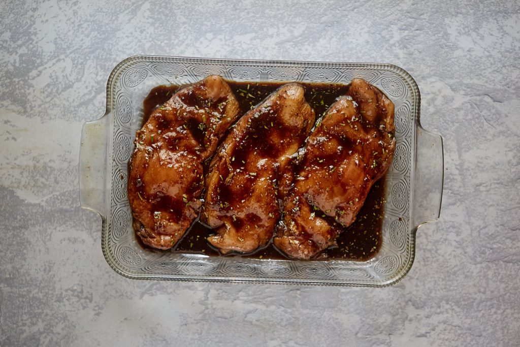 Chicken in marinade ready to bake.