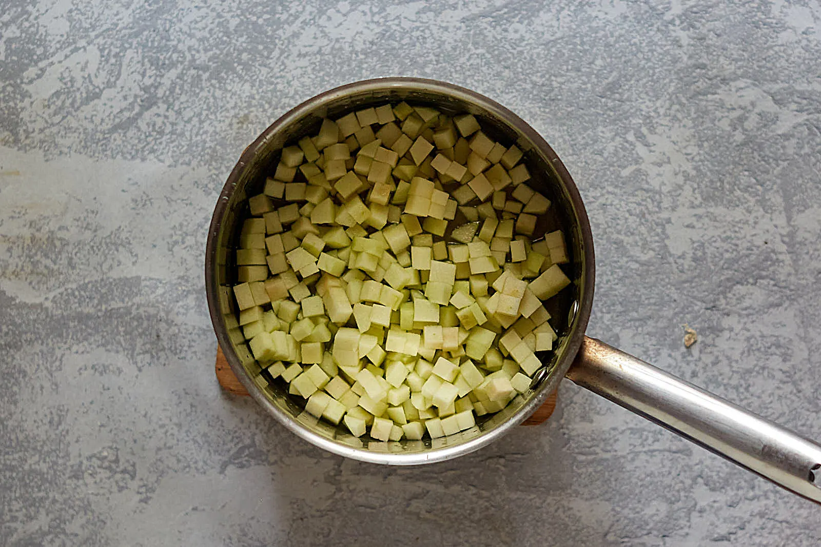 Diced apple in a saucepan