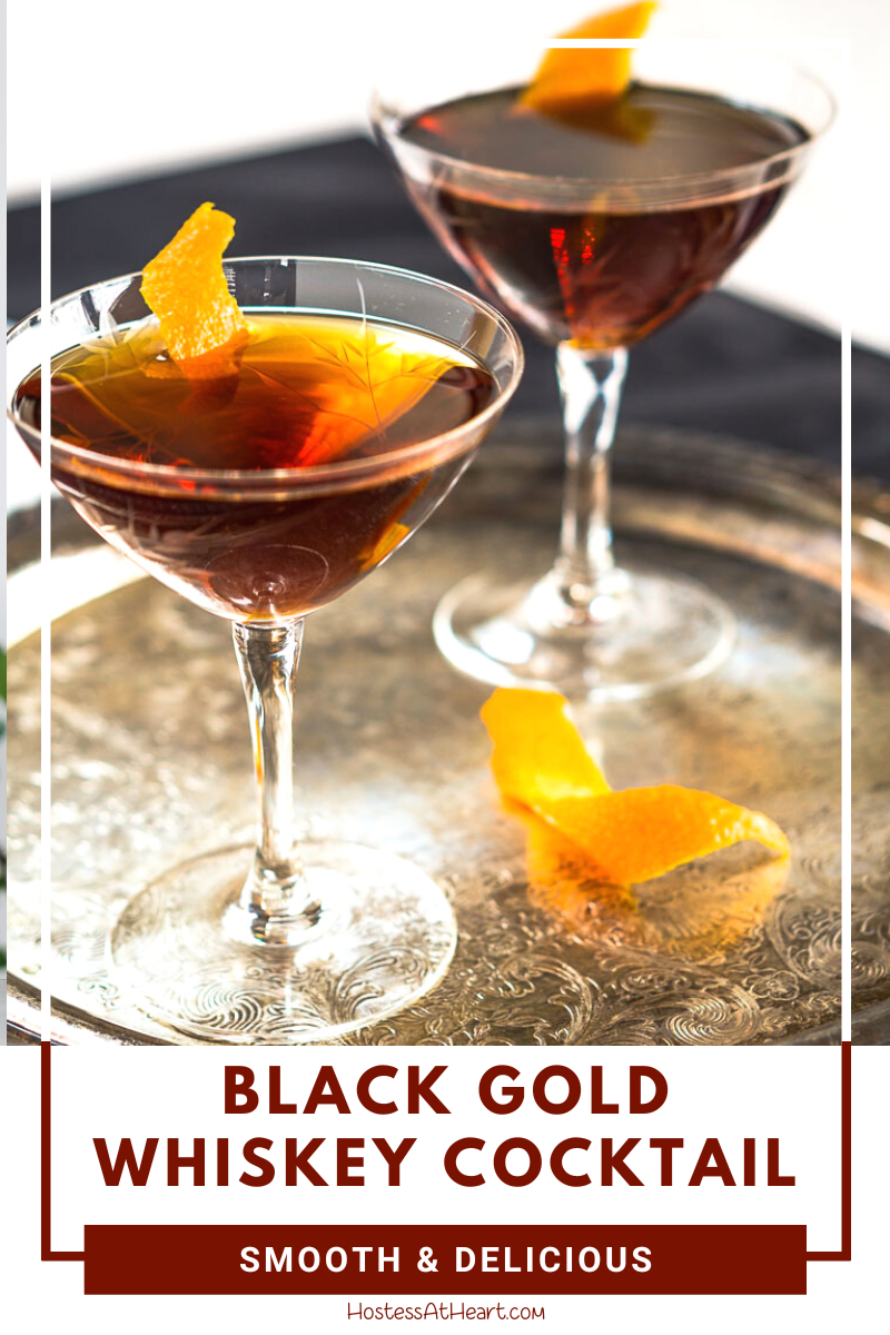 A side view of two Black and Gold Whiskey Cocktails