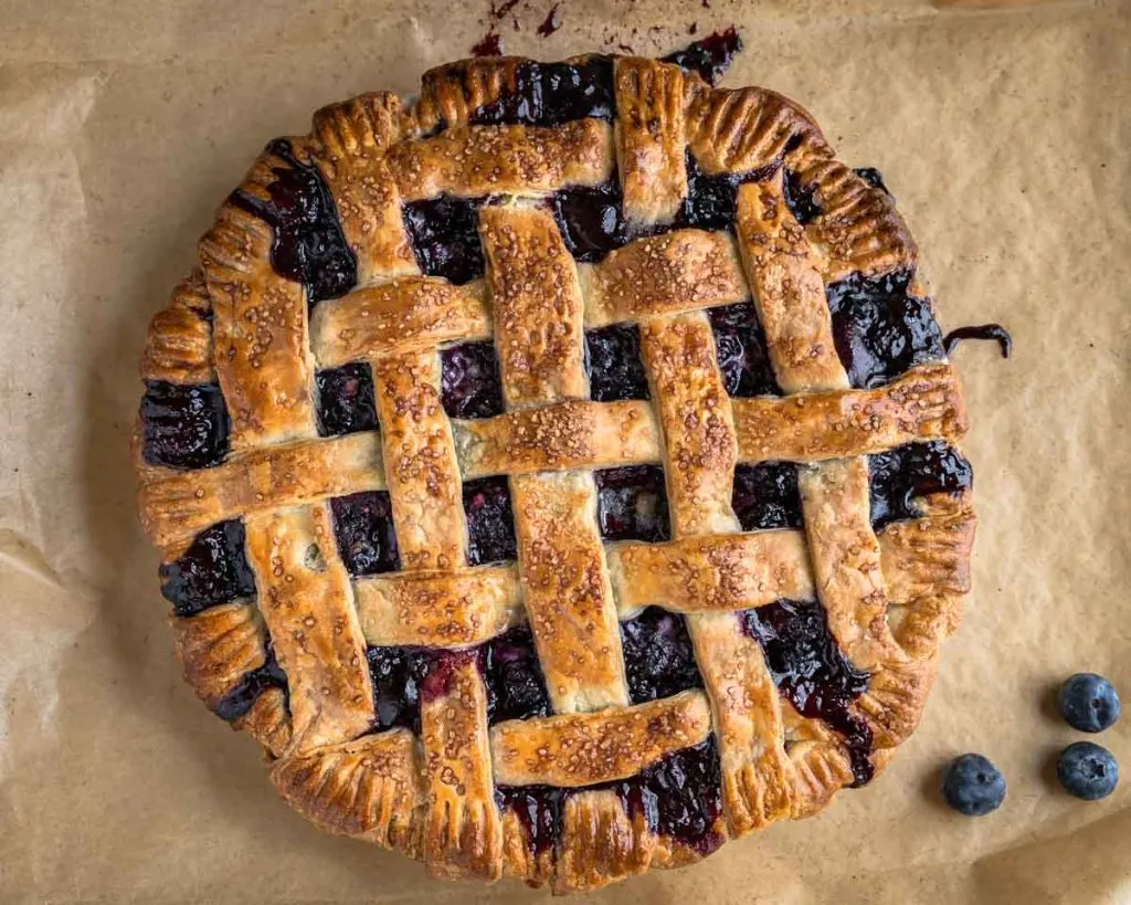 Top down view of a baked pie with a lattice top made with a Pie Dough Recipe