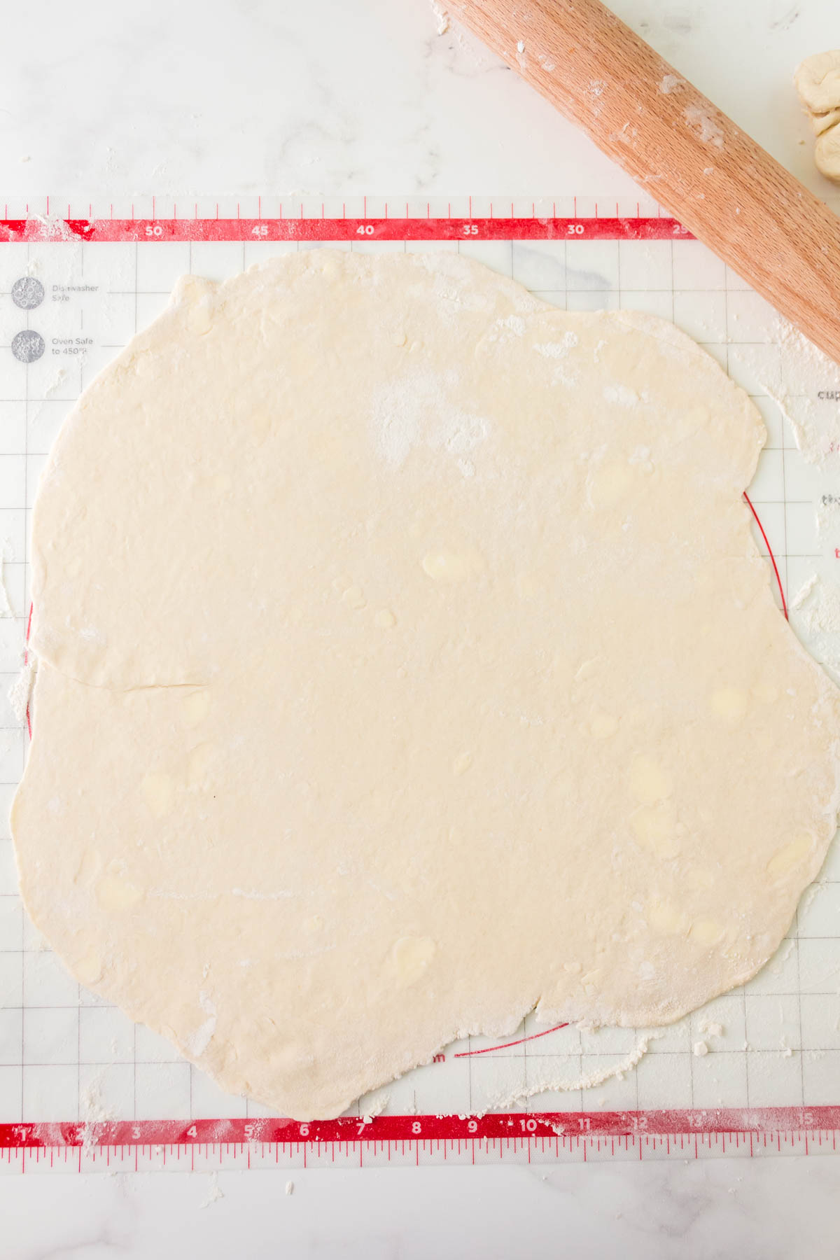 Rolled pie crust without shortening on a pastry mat. Hostess At Heart.