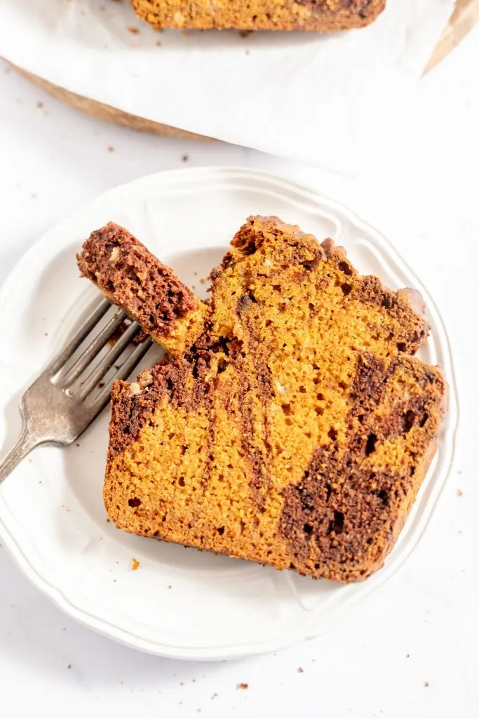 Top down view of pumpkin bread with chocolate swirl