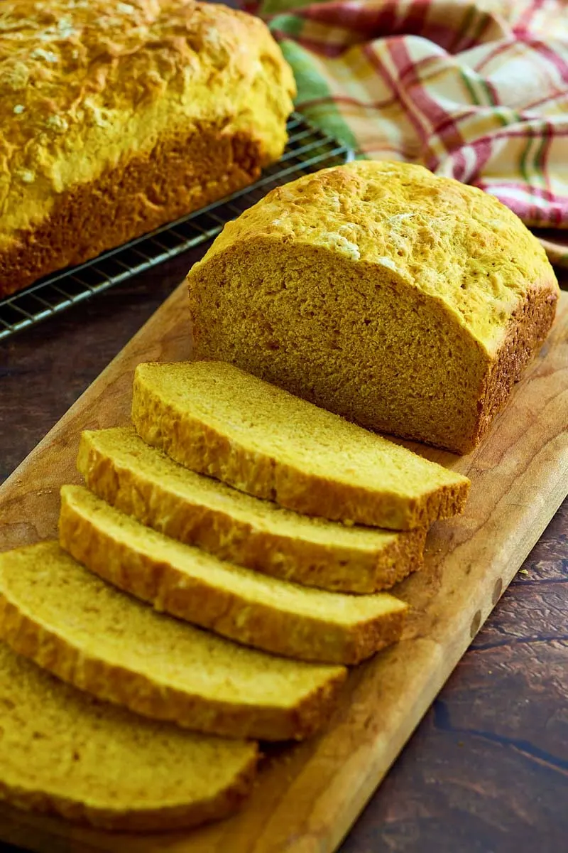 Front view of a loaf of sliced bread madewith pumpkin