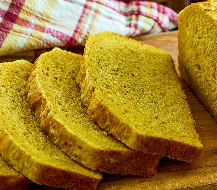 A sliced loaf of pumpkin Bread