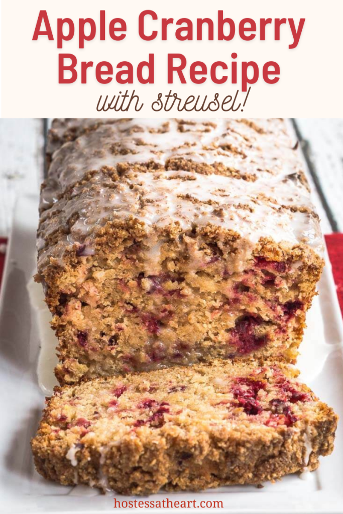 Front view of a loaf of sliced cranberry bread topped with streusel and glazed.