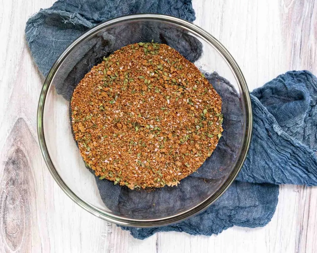 A bowl filled with combined dry rub ingredients for beef brisket