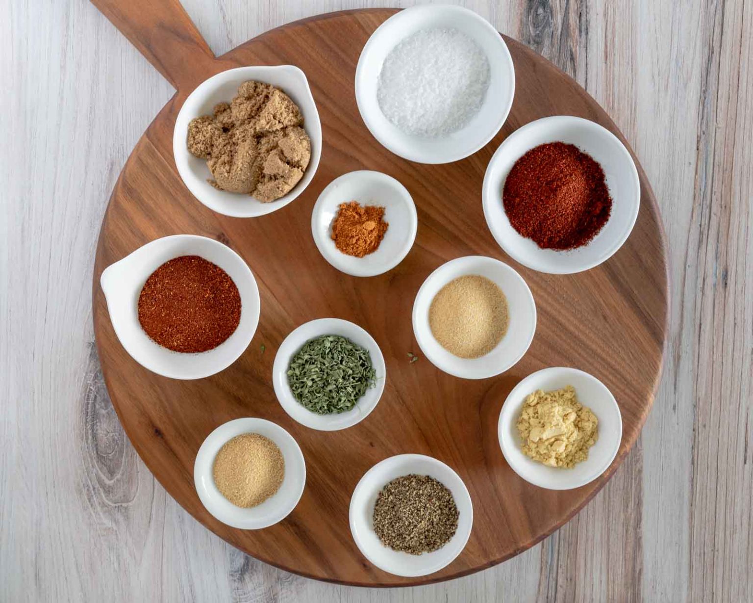 Top down view of the individual spices used to make a brisket dry rub.