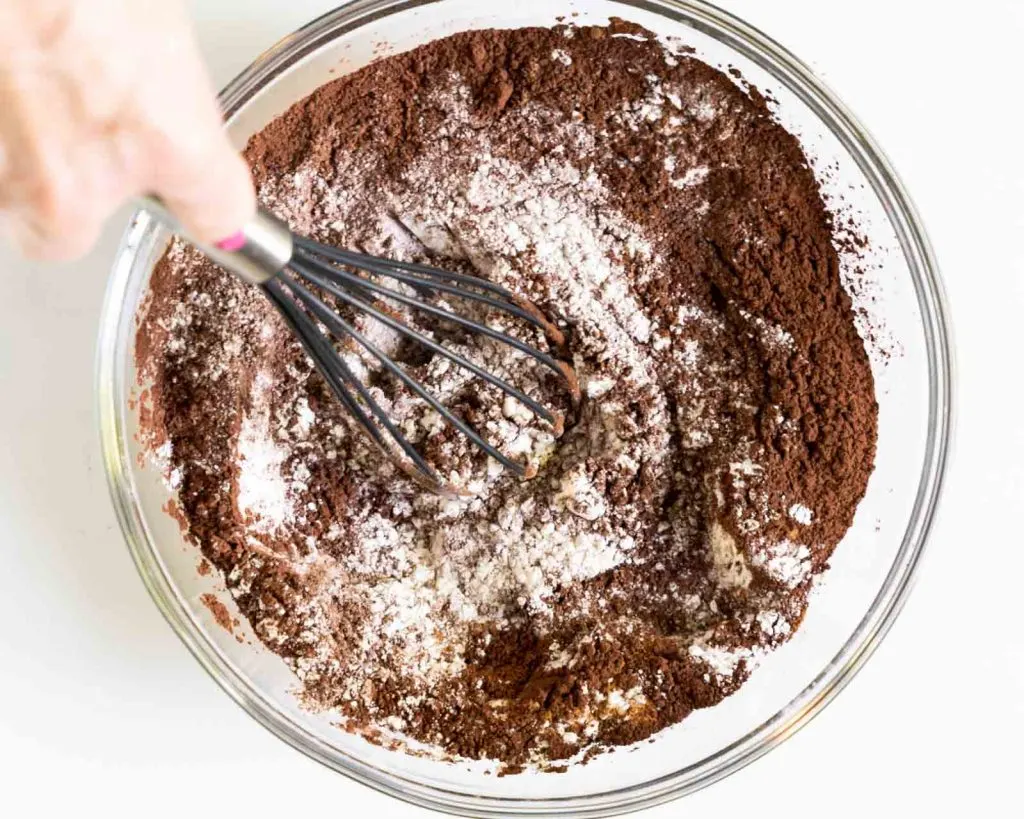 Dry ingredients whisked together in a bowl.