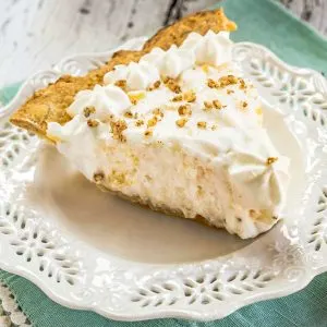 A creamy no-bake pie filled with a whipped topping filling mixed with pineapple