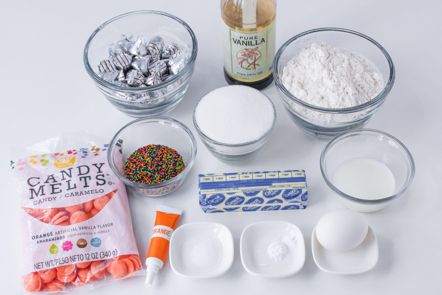 Ingredients: flour, sugar, salt, sprinkles, butter, milk, vanilla, candy melts, orange food coloring, eggs, baking soda. Hostess At Heart.com