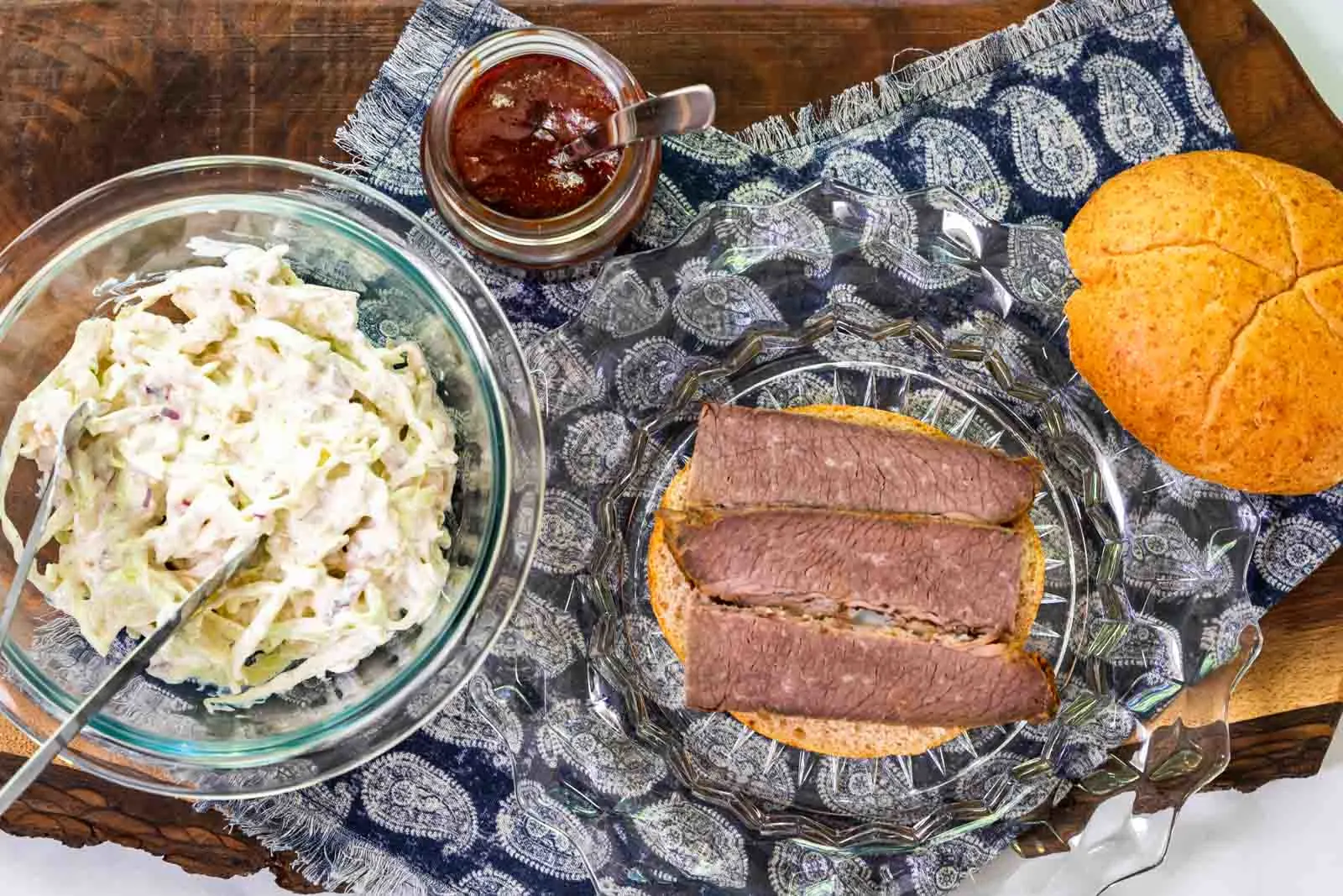 Top down view of the ingredients used to assemble a BBQ briskit sandwich