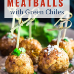 Side view of meatballs made from ground turkey and green chiles garnished with cilantro and cotija cheese.
