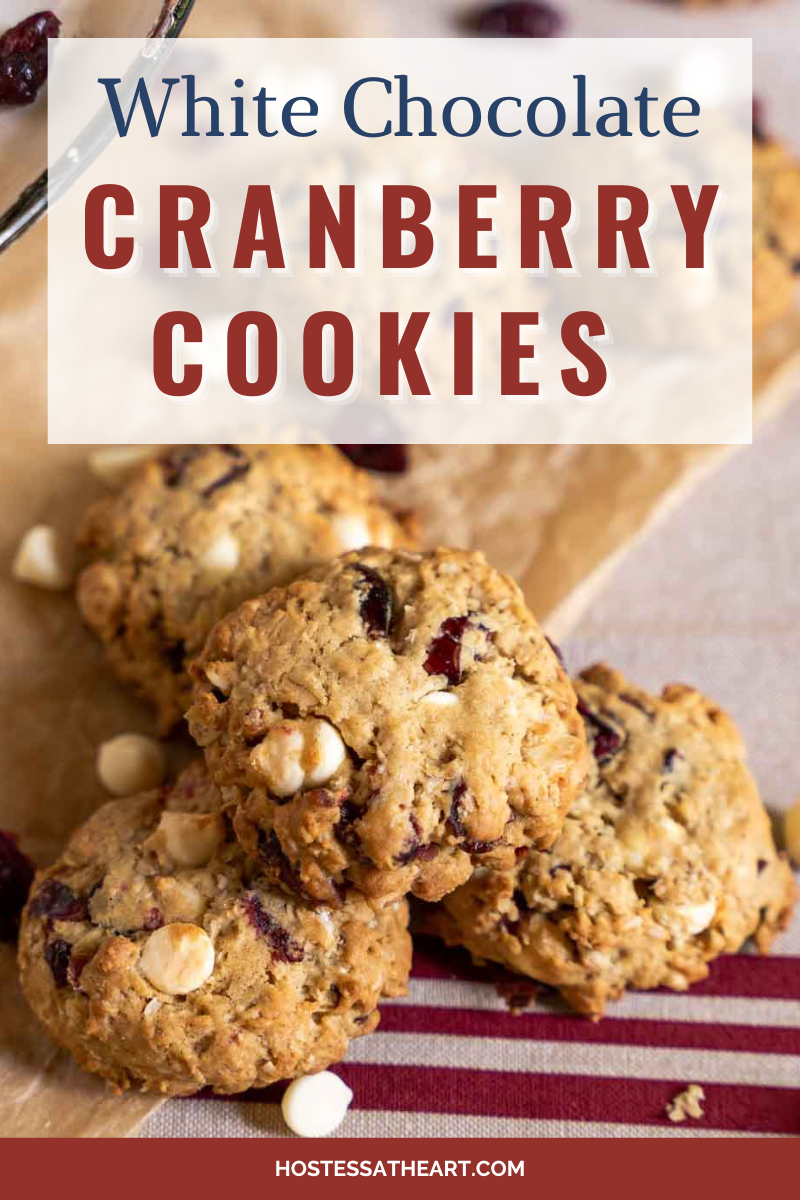 A stack of three oatmeal white chocolate cranberry cookies.