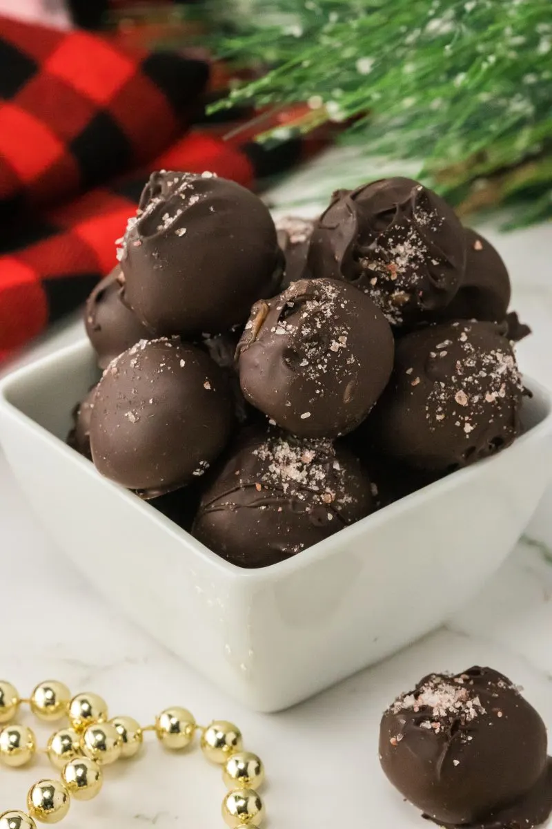 Pile of close-up caramel truffles with sea salt.