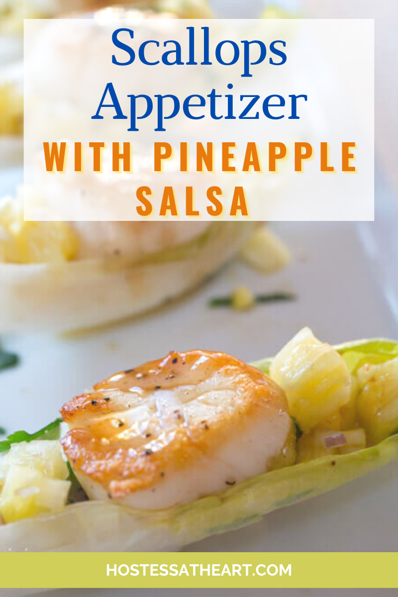 Side view of a cooked scallop appetizer recipe sitting on top of pineapple salsa and drizzled with wasabi sauce - hostess at heart