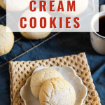 Sour Cream Cookie recipe baked into small cookies and coated in sugar sitting on a white plate with more cookies in the background on a cooling rack. Hostess At Heart