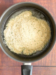 Matzo Cake Meal added to boiling water and oil in a saucepan. Hostess At Heart