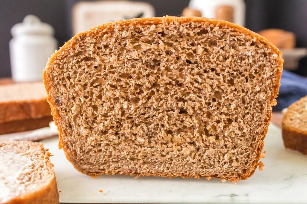 Tableview of a sliced loaf of Whole Grain Bread - Hostess At Heart