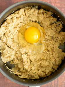 Eggs added to the Matzo meal mixture. Hostess At Heart