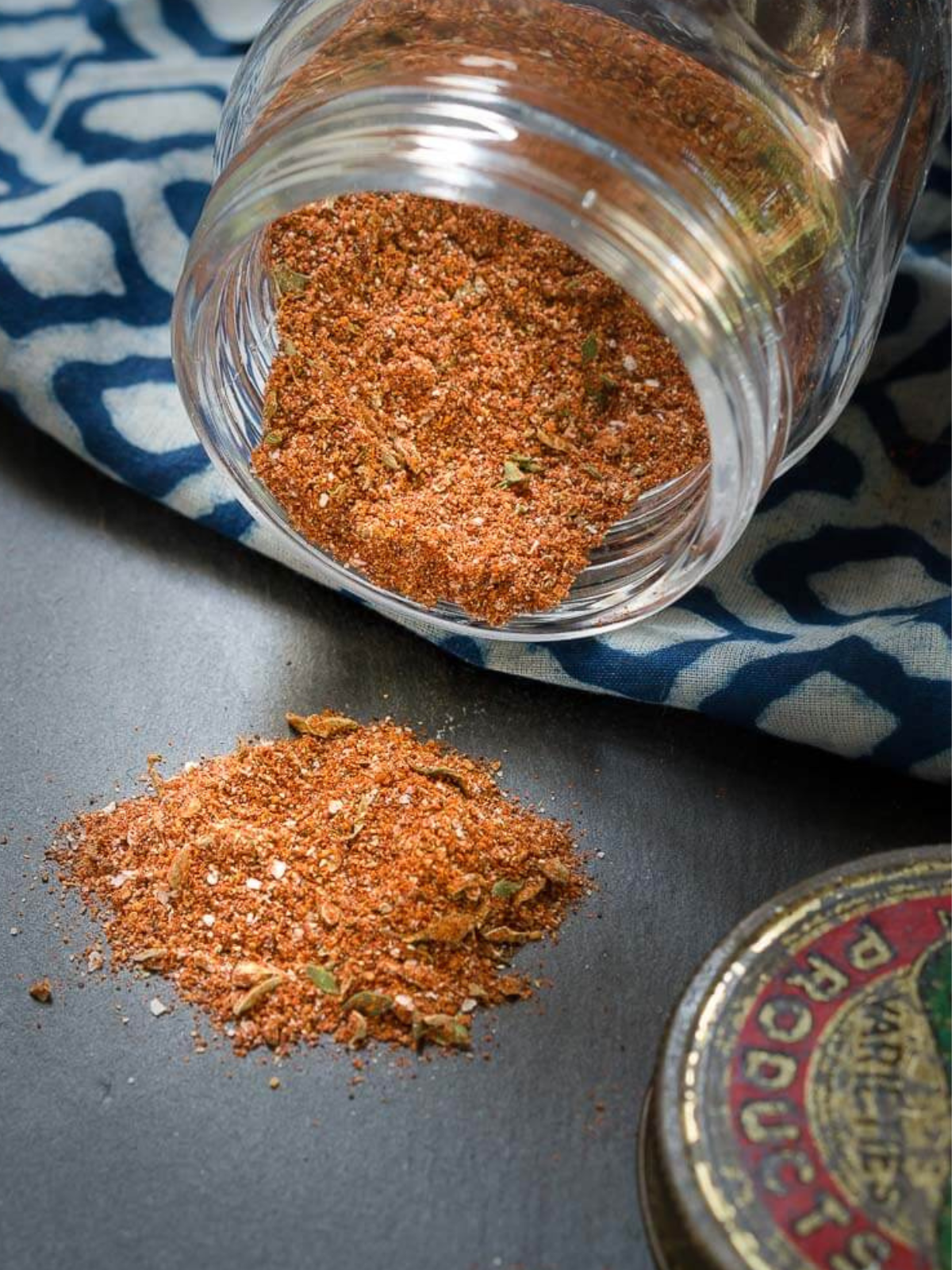 A jar tipped on it's side allowing blackened seasoning to spill out - Hostess At Heart