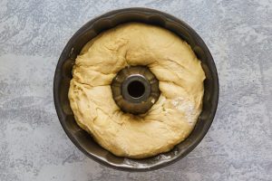 Top down view of bread dough in a bundt pan - Hostess At Heart